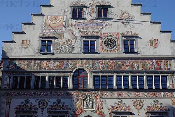 Old town hall in Gothic style with picture friezes