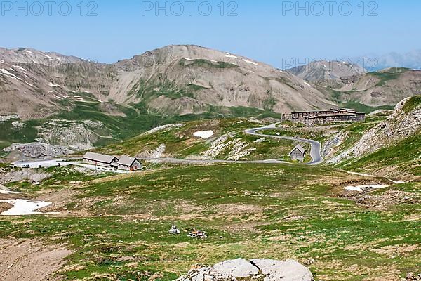 View of alpine high plateau with historic Fortin Fort Garrison Caserne de Restefond on the right