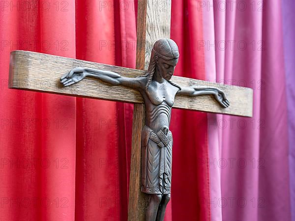 Crucifix in the entrance area of Germany's first private ecumenical motorway church Geiselwind Light on our way on the A 3 between Wuerzburg and Nuremberg