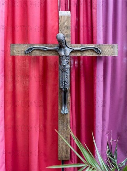 Crucifix in the entrance area of Germany's first private ecumenical motorway church Geiselwind 'Light on our way' on the A 3 between Wuerzburg and Nuremberg