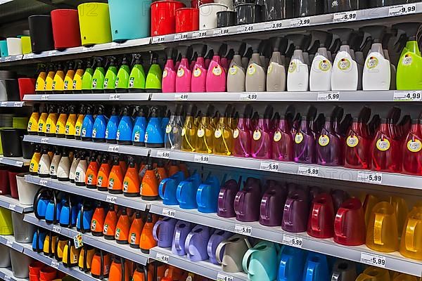 Shelf with spray bottles