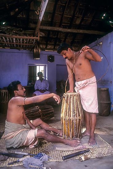 Making of Jendai or leather music instrument in Peruvemba