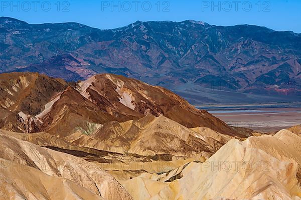 Coloured rock formations in the evening light at Zabriskie Point