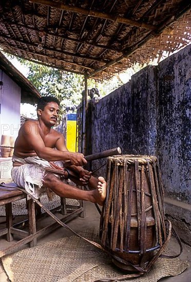 Making of Jendai or leather music instrument in Peruvemba