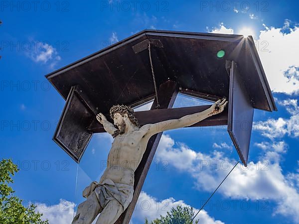 Crucifix in the cemetery of the Catholic parish church of St. George