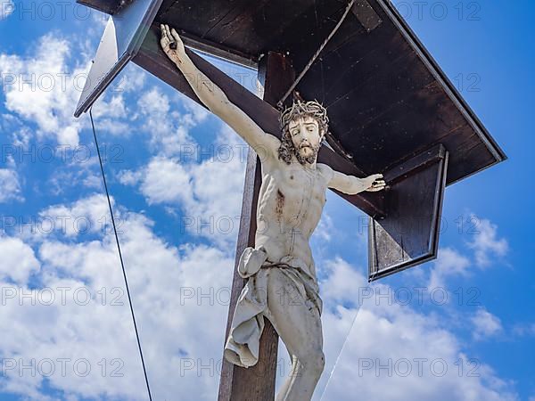 Crucifix in the cemetery of the Catholic parish church of St. George