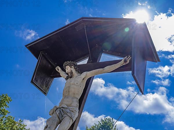 Crucifix in the cemetery of the Catholic parish church of St. George