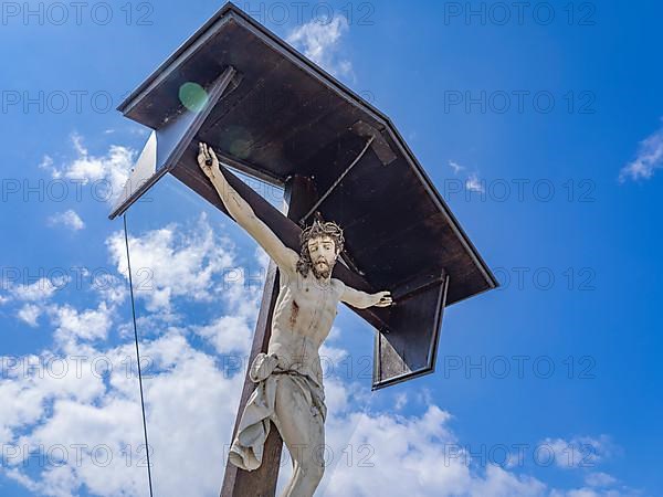 Crucifix in the cemetery of the Catholic parish church of St. George