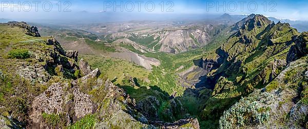 Pointed green mountain peaks on the ridge of Tindfjoell