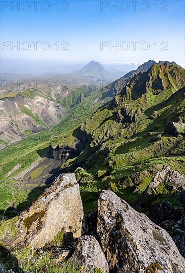 Pointed green mountain peaks on the ridge of Tindfjoell