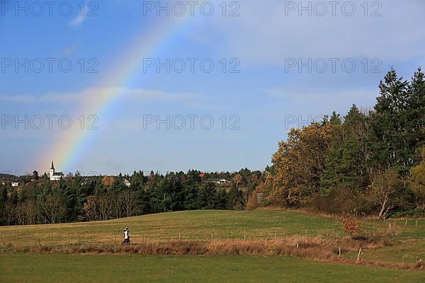 Rainbow over field and woodland near Eschweiler