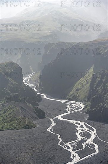 View into mountain valley with river Hvanna