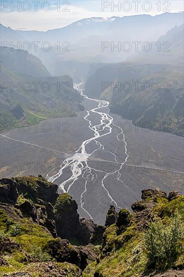 Mountains and river Hvanna in a mountain valley