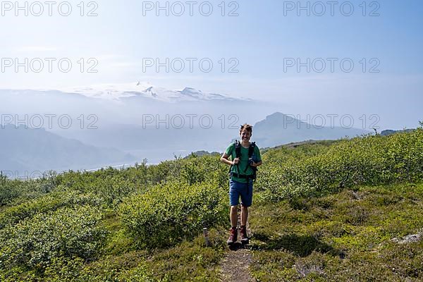 Hikers on trail on Tindfjoell ridge