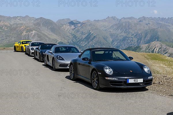 Five Porsche sports cars on 2802 metre highest paved road in Alps