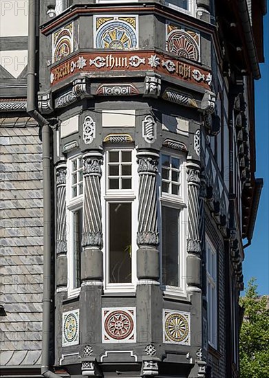 Half-timbered house decorated with carvings in the old town