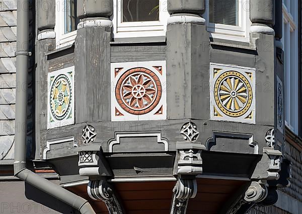 Half-timbered house decorated with carvings in the old town