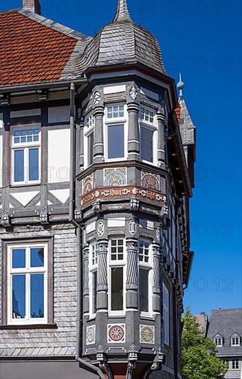 Half-timbered house decorated with carvings in the old town