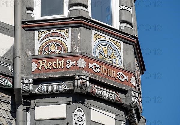 Half-timbered house decorated with carvings in the old town