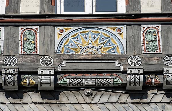 Half-timbered house decorated with carvings in the old town