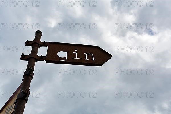 Rusty iron sign