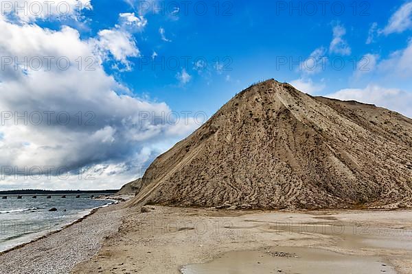 Gravel beach and spoil heap