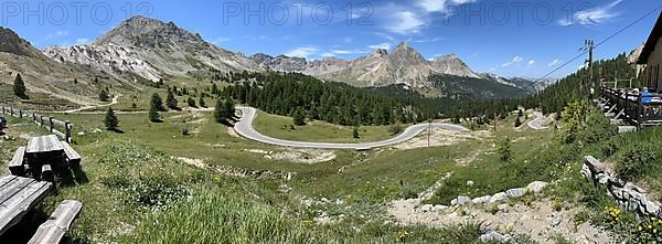 View of winding alpine road mountain road in front of Col de l Izoard