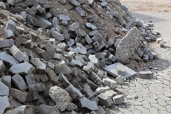 Demolition of an old paved area of an industrial wasteland