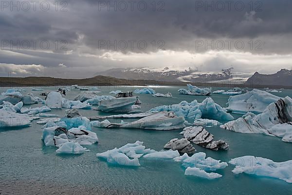 Turquoise ice chunks on the lake Joekulsarlon