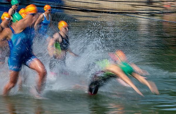 Swimmers compete in the 27th Stadttriathlon in Erding