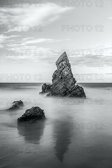 Rocks on Sango Sands Beach Bay Durness in long exposure black and white