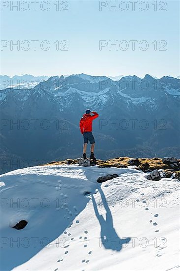 Mountaineer looking into the distance