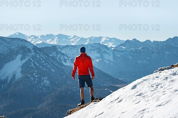 Mountaineers in front of snow-covered mountains