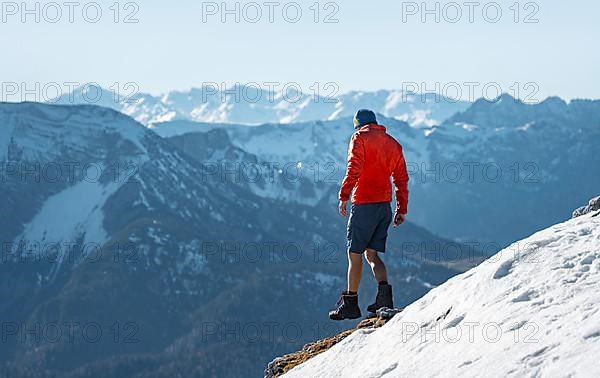 Mountaineers in front of snow-covered mountains