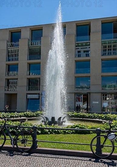 Water fountain on Pariser Platz in front of a DZ Bank branch