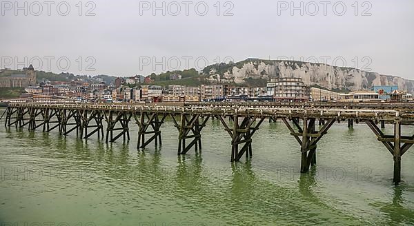 Coastal village of Le Treport at the mouth of the Bresle on the English Channel with Europe's highest chalk cliff and Saint-Jacques church