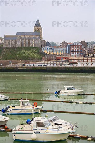 Coastal village of Le Treport at the mouth of the Bresle on the English Channel with Saint-Jacques church