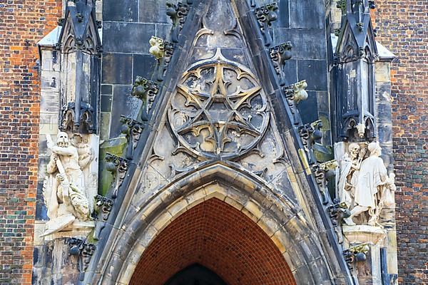 Main portal of the Protestant-Lutheran Market Church of St. Georgii et Jacobi in Gothic style