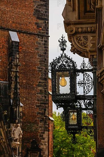 Wrought-iron lights on historic house at corner of Kramerstrasse Marktplatz