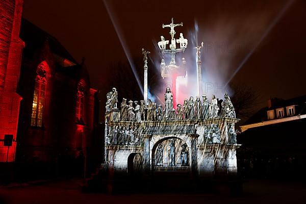 Christmas light projections on the Calvary of Plougastel-Daoulas next to the church of Saint Pierre