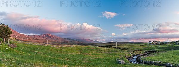 Sunset of Mountain and Meadows over Smoo Cave