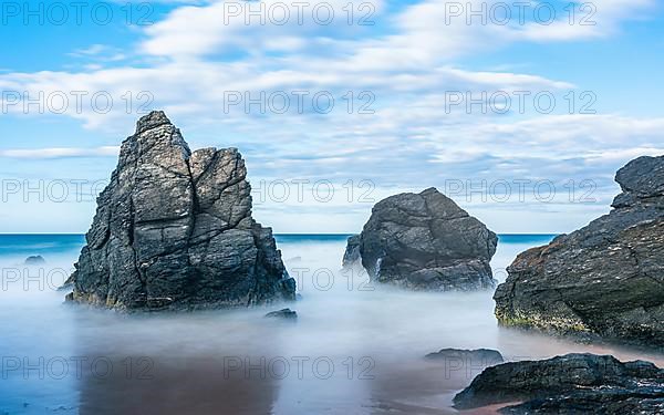 Rocks on Sango Sands Beach Bay Durness in long exposure