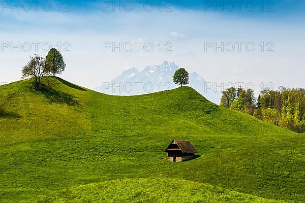 Panorama with huts and hills