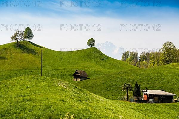 Panorama with huts and hills