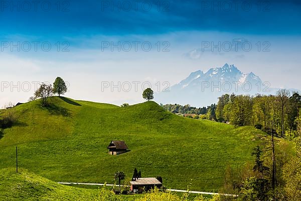 Panorama with huts and hills