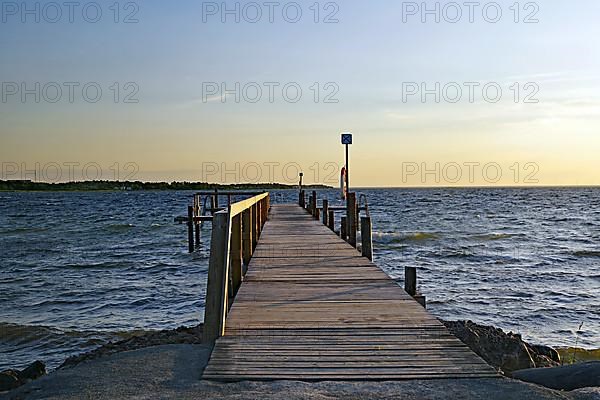 Wooden bathing jetty in the evening light