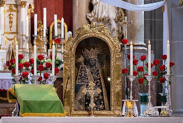The Black Madonna in the collegiate parish church of St. Philip and St. James in the pilgrimage town of Altoetting. The image of grace is normally in the Holy Chapel