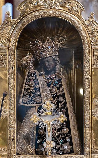 The Black Madonna in the collegiate parish church of St. Philip and St. James in the pilgrimage town of Altoetting. The image of grace is normally in the Heilgen Kapelle