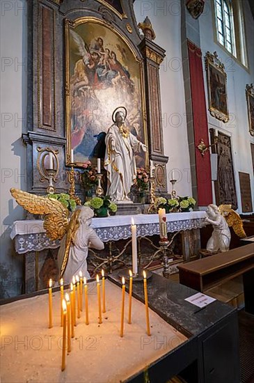 Side altar in the collegiate parish church of St. Philip and St. James