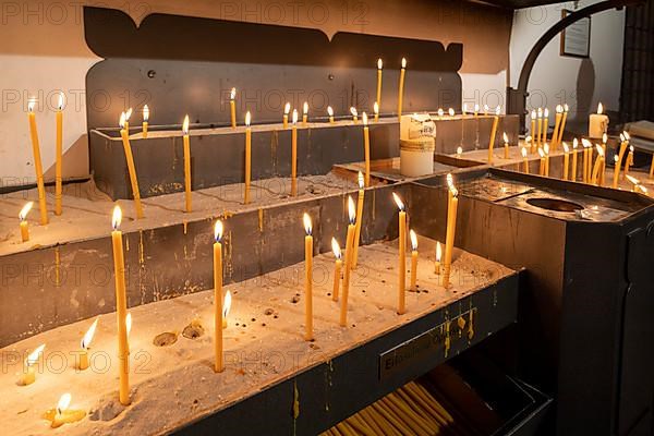 Candles in the collegiate parish church of St. Philip and St. James